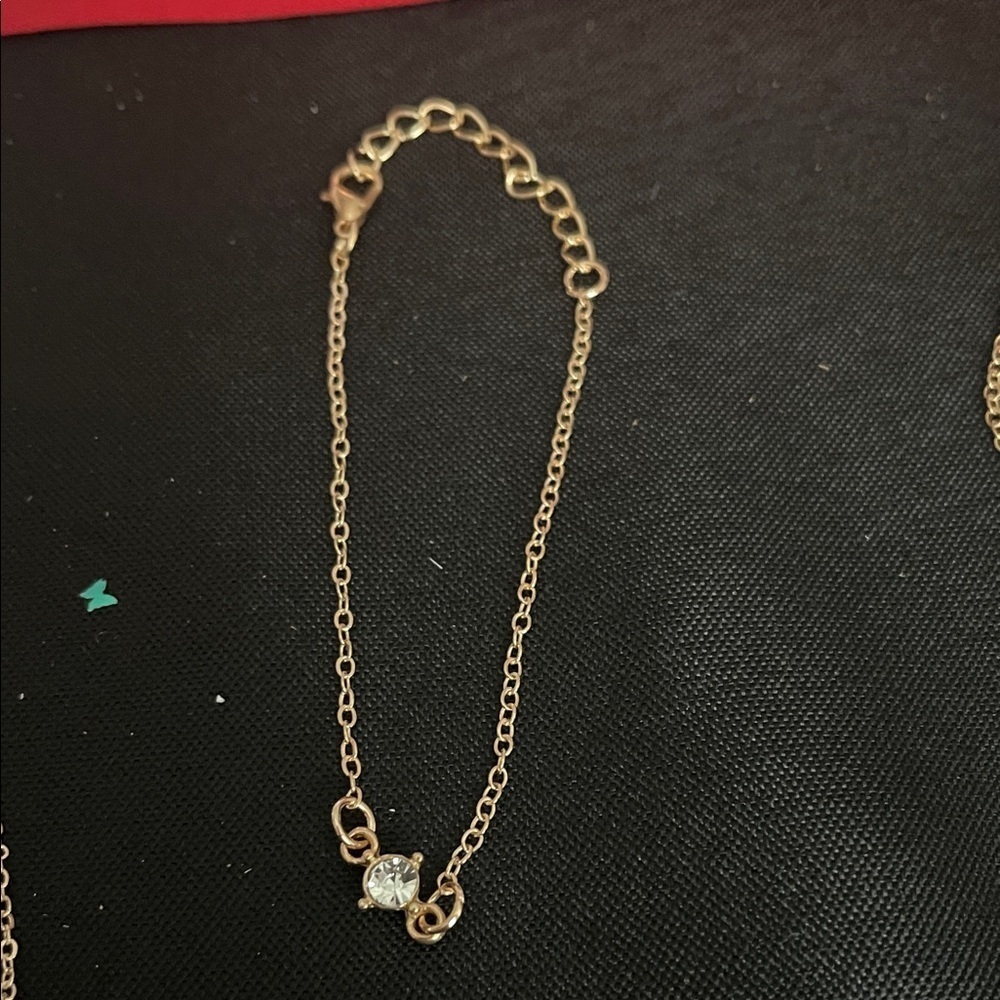 Elegant Gold Tone Chain Bracelet with Crystal Accent